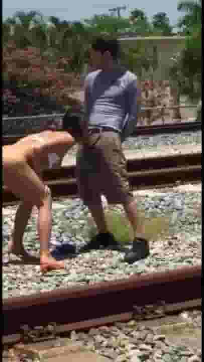 Adriana Chechik's fucking next to a train, gets caught by a passer by..