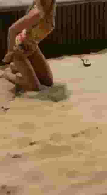 Stripping in a sandpit in the middle of the mall [GIF]