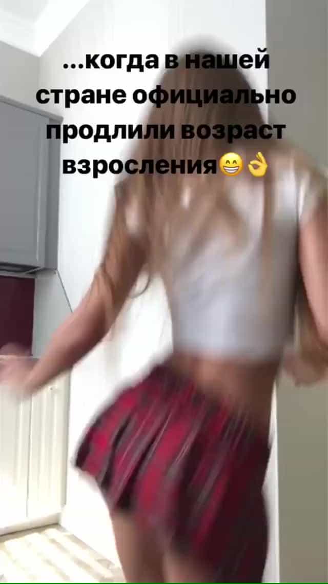 Valentina Grishko jumping in a skirt