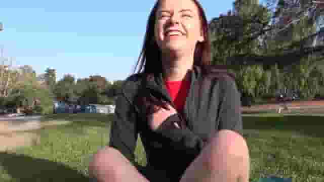 Cute girl flashes in a park [GIF]