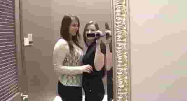 College friends having fun in the changing room
