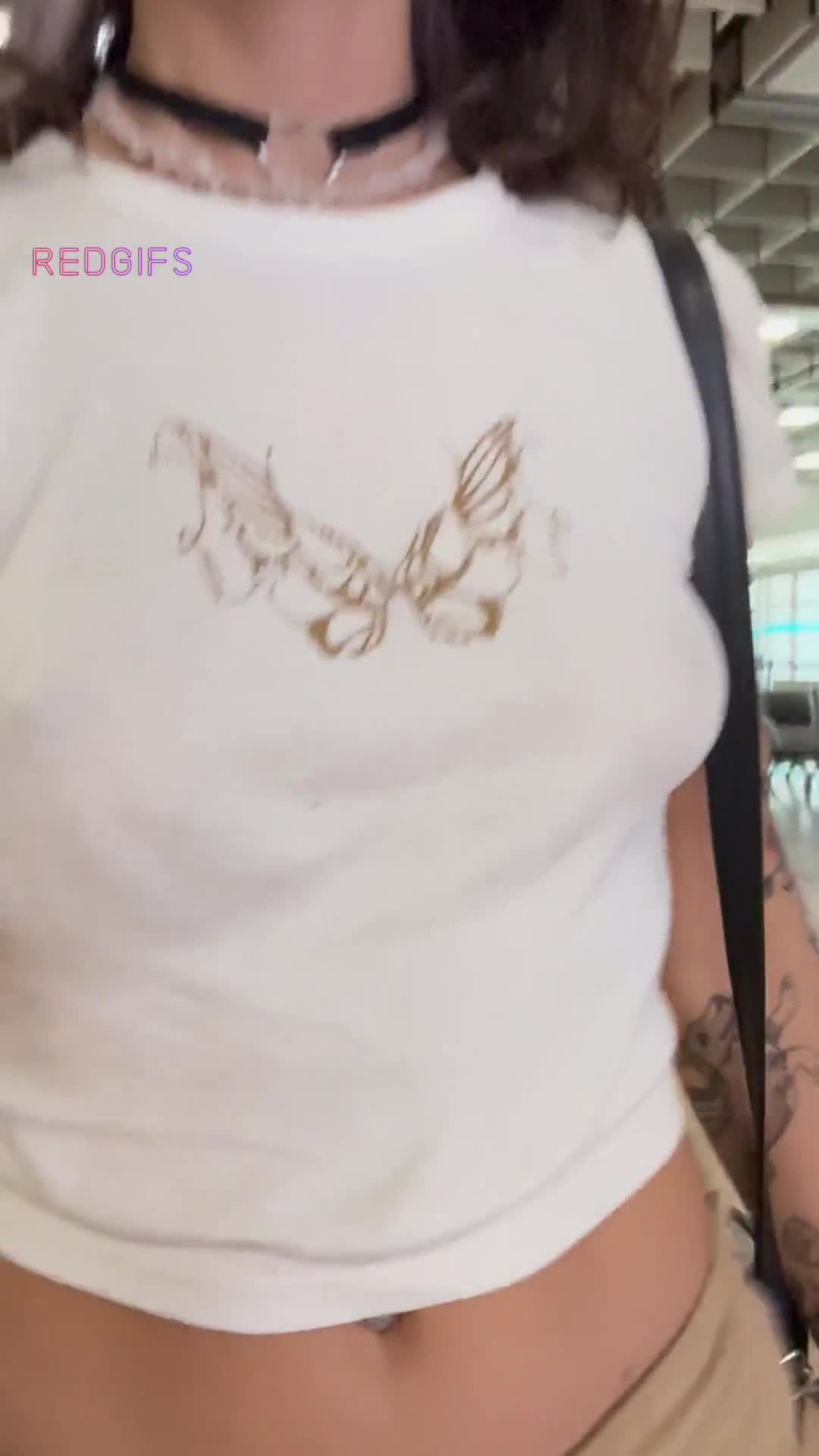 Braless at the airport 