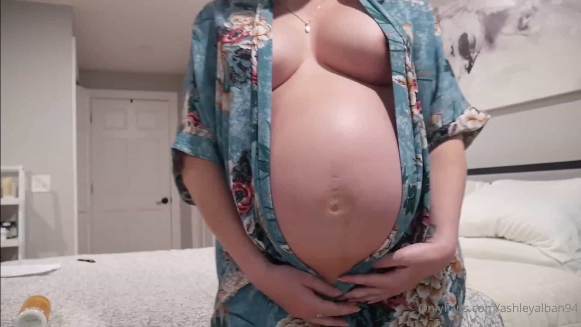 Showing off her Pregnant Body